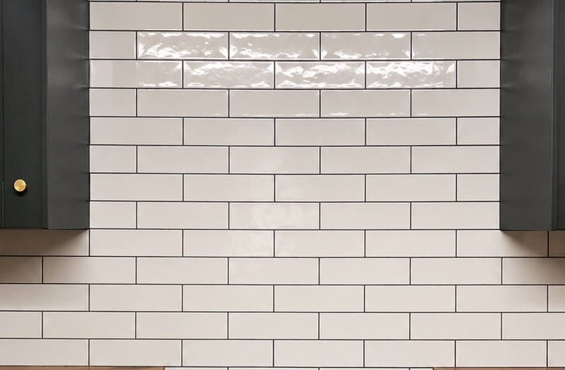 Metro subway tile kitchen splashback by JPR Bathrooms